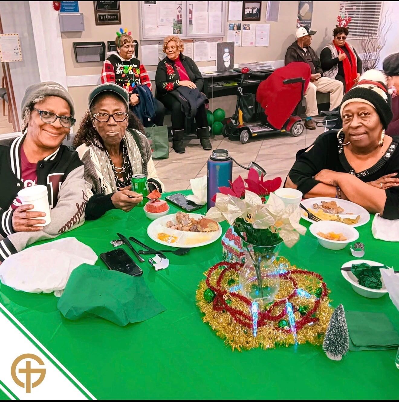 Holiday Luncheon Senior residents smiling together at a Golden Cross holiday luncheon
